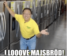 a man in a yellow shirt is standing in front of a row of fridges with the caption i looove majsbröd