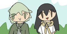 a boy and a girl are standing next to each other in a field