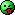 a pixel art smiley face with a red tongue sticking out .