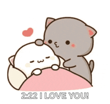 a couple of cats laying on top of each other on a bed with the words `` 2:22 i love you '' .