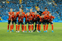 a group of soccer players pose for a team photo with jp written on their jerseys