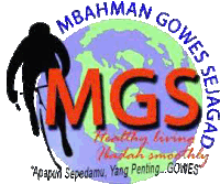 a logo for mgs shows a person riding a bike around the earth