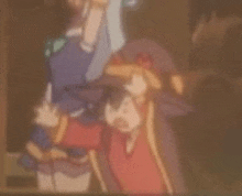 a blurry picture of a couple of anime characters standing next to each other in a dark room .