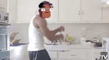 a man in a white tank top is preparing food in a kitchen with a bbc logo on the counter