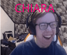 a man wearing headphones and glasses with the name chiara on the bottom