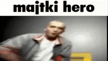 a blurry picture of a man with the words majtki hero on the bottom