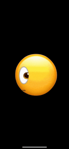 a yellow smiley face with a black eye on a black background