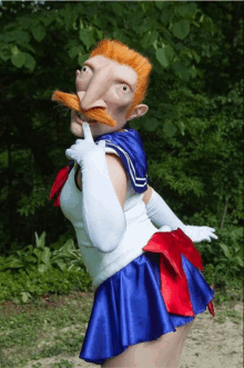 a person in a sailor moon costume with a red mustache