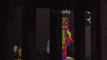 a pixel art drawing of a clown with the name alfgoto on the bottom