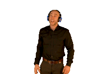 a man wearing headphones and a black shirt is dancing