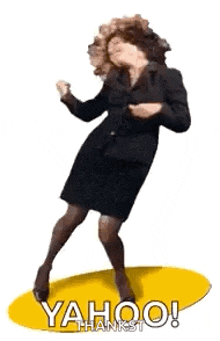 a woman in a black dress is dancing on a yellow circle with the words yahoo thanks written on it .