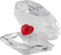 a crystal oyster with a red heart inside