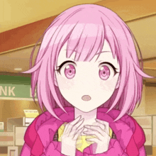 a girl with pink hair and pink eyes is standing in front of a sign that says nk
