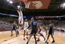 a basketball player with the number 21 on the back of his jersey