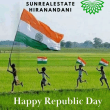 a group of children running in a field holding flags with the words happy republic day below them