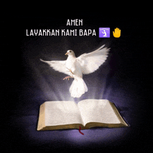 a white dove is flying over an open bible with the words amen layakkan kami bapa