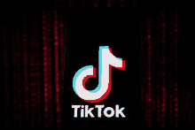 a tik tok logo is displayed on a cell phone against a red background .