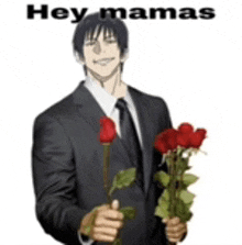 a man in a suit and tie is holding a bunch of roses .