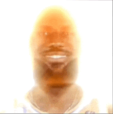 a close up of a man 's face with a beard on a white background