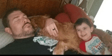 a man laying on a bed with a child and a dog wearing a shirt that says snacks before nap