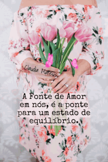 a woman in a floral dress is holding a bouquet of pink flowers and a quote from claudia mateus