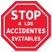 a stop sign that says stop a los accidentes