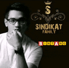 a black and white photo of a man with the words sindikat family bintang