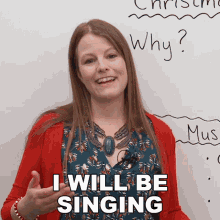 a woman stands in front of a white board with the words " i will be singing " written on it