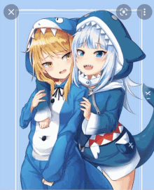 a couple of anime girls wearing shark costumes