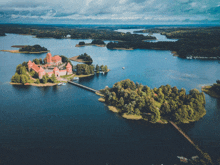 an aerial view of a lake with a small island in the middle