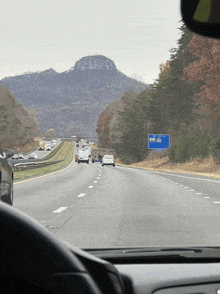 a blue sign on the side of a highway that says ' i-270 ' on it