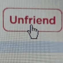 a computer screen shows a hand pointing to the word unfriend