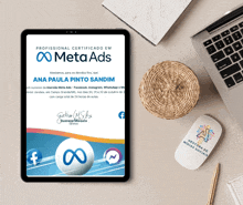 a tablet displays a certificate for meta ads