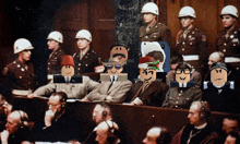 a group of people sitting in a courtroom with a man wearing a santa hat and sunglasses