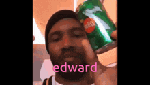 a man is holding a can of sprite in his hand