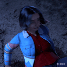 a woman in a blue jacket and red shirt is on a netflix advertisement