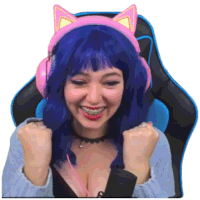 a woman with blue hair is wearing headphones and a cat ear headband