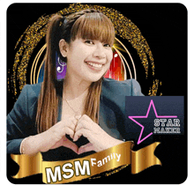 a woman making a heart with her hands and the name msm family on the bottom