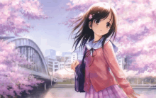 a girl in a pink sweater and purple skirt stands in front of a bridge