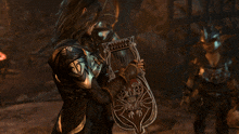 a man in armor is holding a lyre in his hands