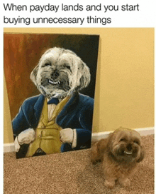 a dog is sitting next to a painting of a dog in a suit and tie