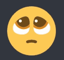 a yellow smiley face with brown eyes and white circles