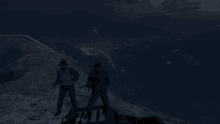 two men standing on top of a mountain with a city in the background and a screen that says ' lcg '