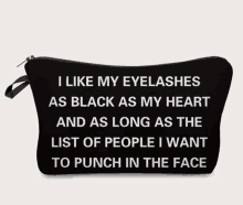 a black cosmetic bag that says ' i like my eyelashes as black as my heart ' on it