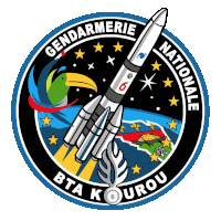 a logo for gendarmerie nationale bta kourou with a rocket