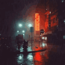 a rainy night in a city with a sign that says 3