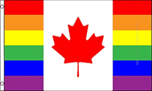 a canadian flag with a red maple leaf and rainbow stripes