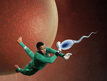 a man in a green uniform is jumping in the air while holding a sperm