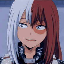 a girl with half red and half white hair is smiling .