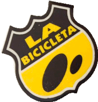 a black and yellow la bicicleta emblem with a circle in the middle